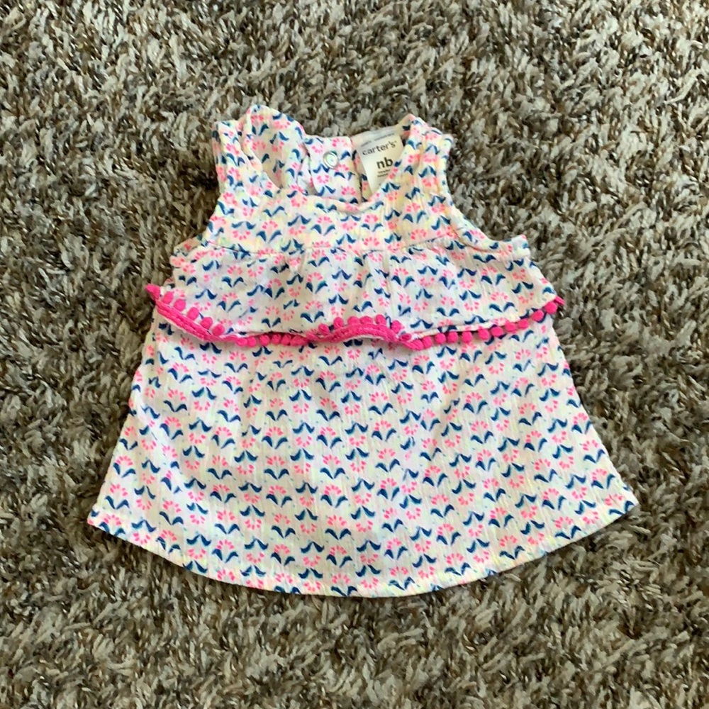 Carter’s baby girl top. Size Newborn.